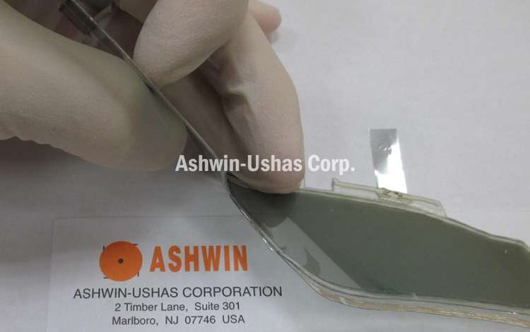Example of exceptional flexibility, durability and thinness of electrochromic lens.